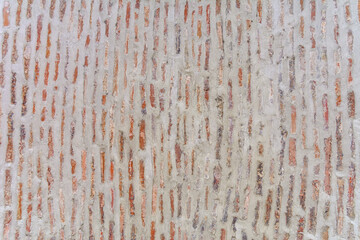 Vertical wall of brick concrete background
