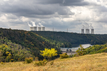 Meadow, forest, dam and nuclear power plant