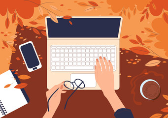 Top view on female hands working behind a laptop on the grass in an autumn park. Flat vector illustration of freelance outdoors