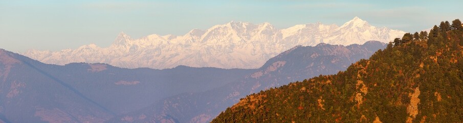 Naklejka na ściany i meble Evening panoramic view of Indian Himalaya mountain