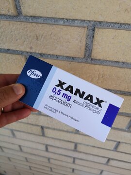 box of the drug xanax of the pfizer in hand