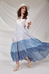 Beautiful sexy brunette woman wear summer collection dress style cruise collection fashion model...