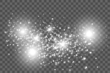 Vector sparkles on a transparent background. Christmas abstract pattern. Sparkling magical dust particles.