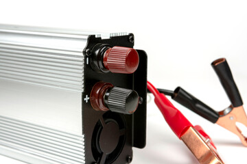 electrical device for converting electric current complete with terminals