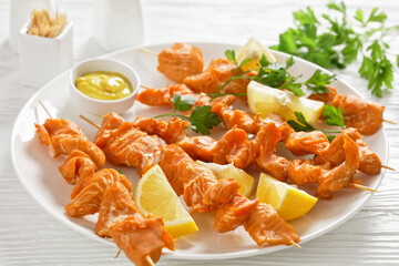 juicy grilled salmon kebabs with lemon and parsley
