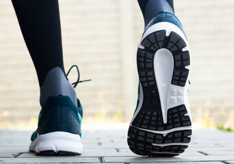 close up view of shoes of guy starting the jogging