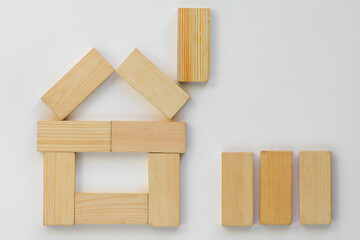 Top view of method how to play with wooden dominoes gaming pieces for children on the white background