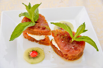 Close Up Shot Of Turkish Bread Kadayif Garnished with Mint Leaves