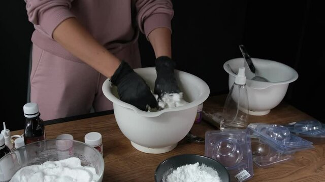 handmade bath bombs process. Preparation of bath bombs. Ingredients and floral decor on a wooden vintage table.