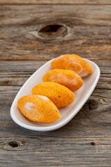 Raw kibbeh on wood background. Middle Eastern traditional cuisine