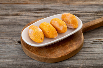 Raw kibbeh on wood background. Middle Eastern traditional cuisine