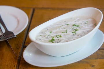 A bowl of homemade cream of mushroom soup