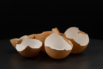 Broken of egg shell group crack  isolated on black background