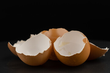 Broken of egg shell group crack  isolated on black background