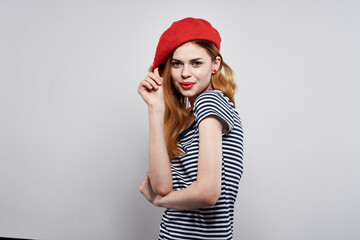 Naklejka premium beautiful woman posing fashion attractive look red earrings jewelry model studio