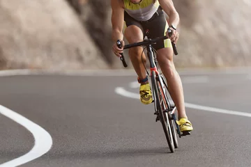 Wandcirkels aluminium Road bike cyclist man cycling, athlete on a race cycle © pavel1964