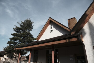 A photo of a simple station in the countryside station.