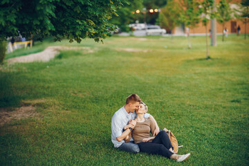 Naklejka na ściany i meble happy couple in a park