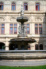 Fototapeta na wymiar Vienna state Opera house fountain and architecture view, capital of Austria