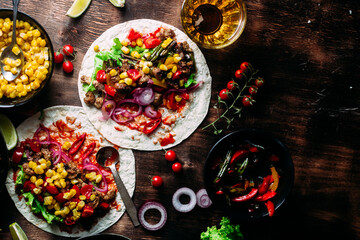 Tacos with meat and vegetables. Cooking tacos