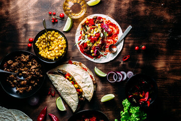 Tacos with meat and vegetables. Cooking tacos