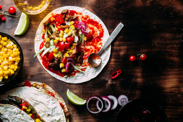 Tacos with meat and vegetables. Cooking tacos