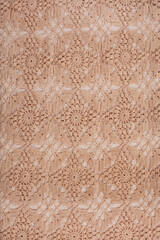 old crochet cloth pattern as background