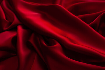 Obraz premium Red fabric texture background. Silk satin folds