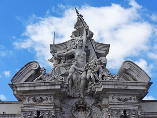 the statue of a warrior woman with sword and spear in the gateway statue of military museum,...