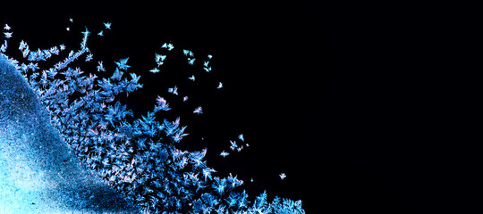 Frozen winter window. Window frozen glass, ice crystals. Snow frame. Beautiful Hoarfrost pattern,...