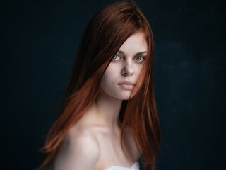 Fototapeta premium woman with bare shoulders and attractive look cropped view isolated background