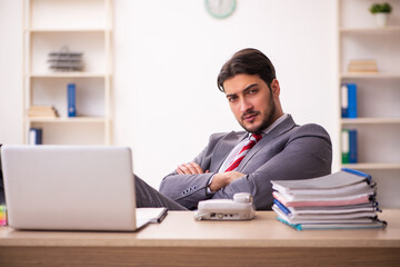 Young businessman employee working in the office