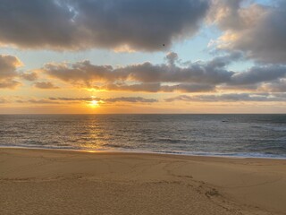Naklejka na ściany i meble Sunset on the sea beach picture 