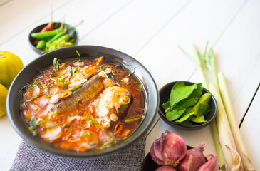 Delicious salad canned fish with vegetables of herbs, lemon, lemongrass, kaffir lime leaves, Shallot, pepper. The simple, homemade cooking menu during the quarantine concept Thai food