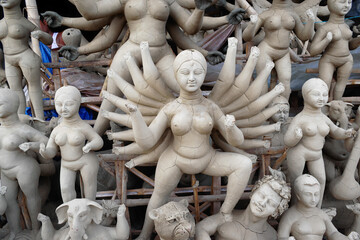 Clay idol of Goddess Devi Durga is in preparation for the upcoming Durga Puja festival at a pottery...