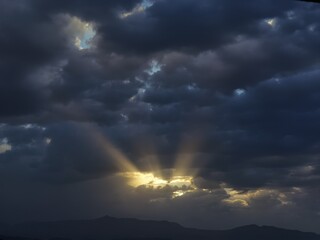 sun among clouds light curtains diffuse background