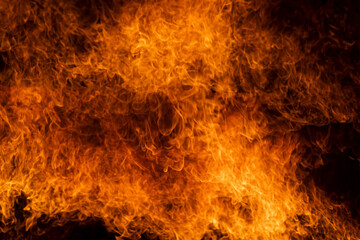 Sparks and fire particles,Flying up embers and burning cinder,Smoke,Fire flames on a black...
