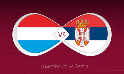 Obraz premium Luxembourg vs Serbia in Football Competition, Group A. Versus icon on Football background.