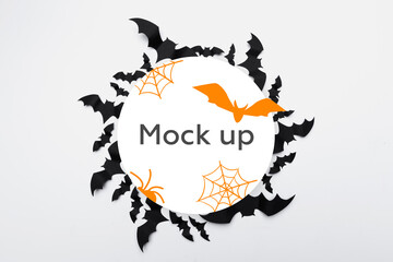 Halloween concept - paper bats on white background