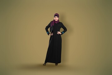 Full length young arabian muslim woman in abaya hijab