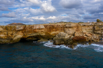 Fototapeta na wymiar Azure water view with cliffs, Crete, Greece