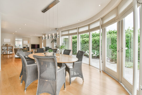 Dining room interior with furniture in contemporary house