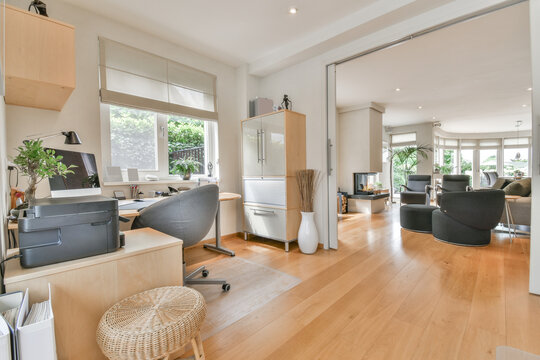 Modern room interior with furniture on parquet at home