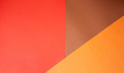 red, brown, orange paper. geometric background