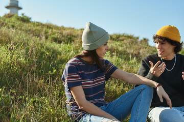 Two enthralled youngsters having a casual chat