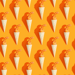 seamless pattern. small pumpkin in a ice cream cone