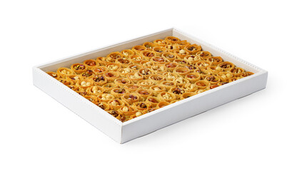 Assortment of Turkish baklava dessert in a white box isolated on white