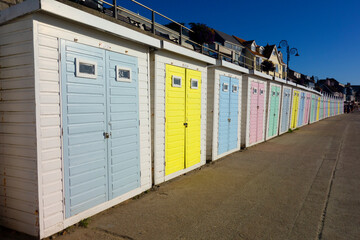 Colourful Beach Huts on The Lyme Regis Coast Line on the English South Coast Seaside