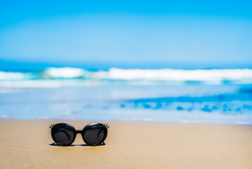 Sunglass on the sand