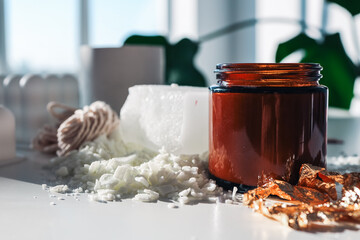 Handmade ecological and vegan soy wax candles with wooden wick. Amber and opaque container. Mock up, space for text.